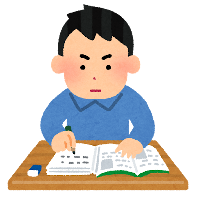 机で勉強する男性